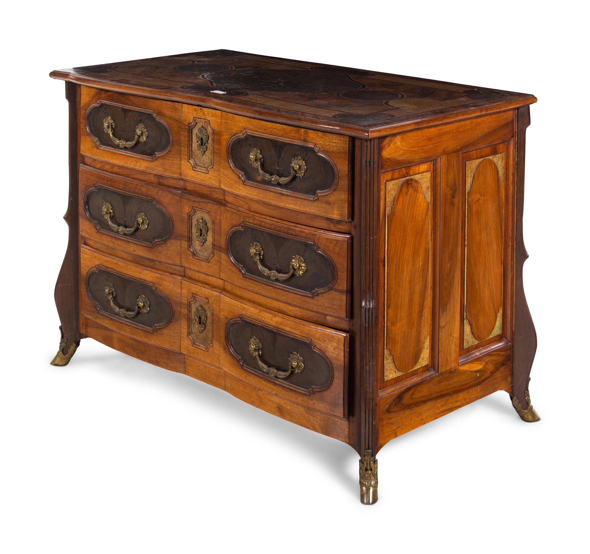 A Louis XIV Gilt Bronze Mounted Walnut and Oysterwood Commode