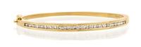 A 14 Karat Yellow Gold and Diamond Bangle Bracelet, 12.70 dwts.