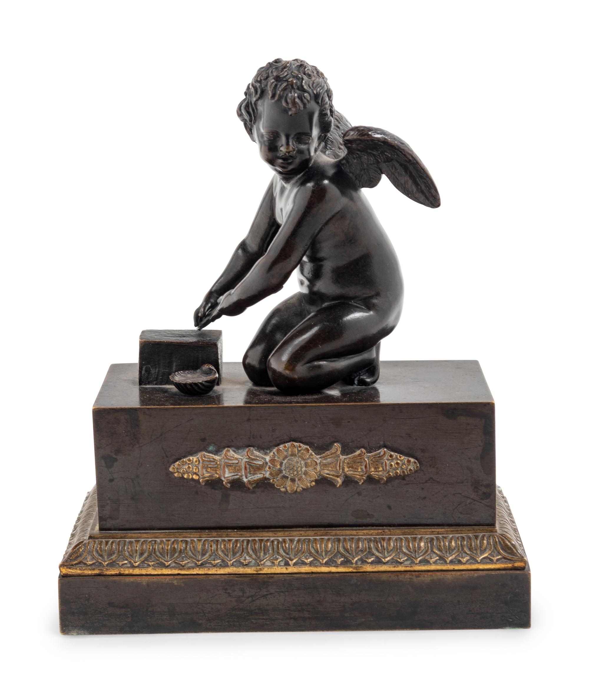 An Empire Patinated Bronze Figural Encrier