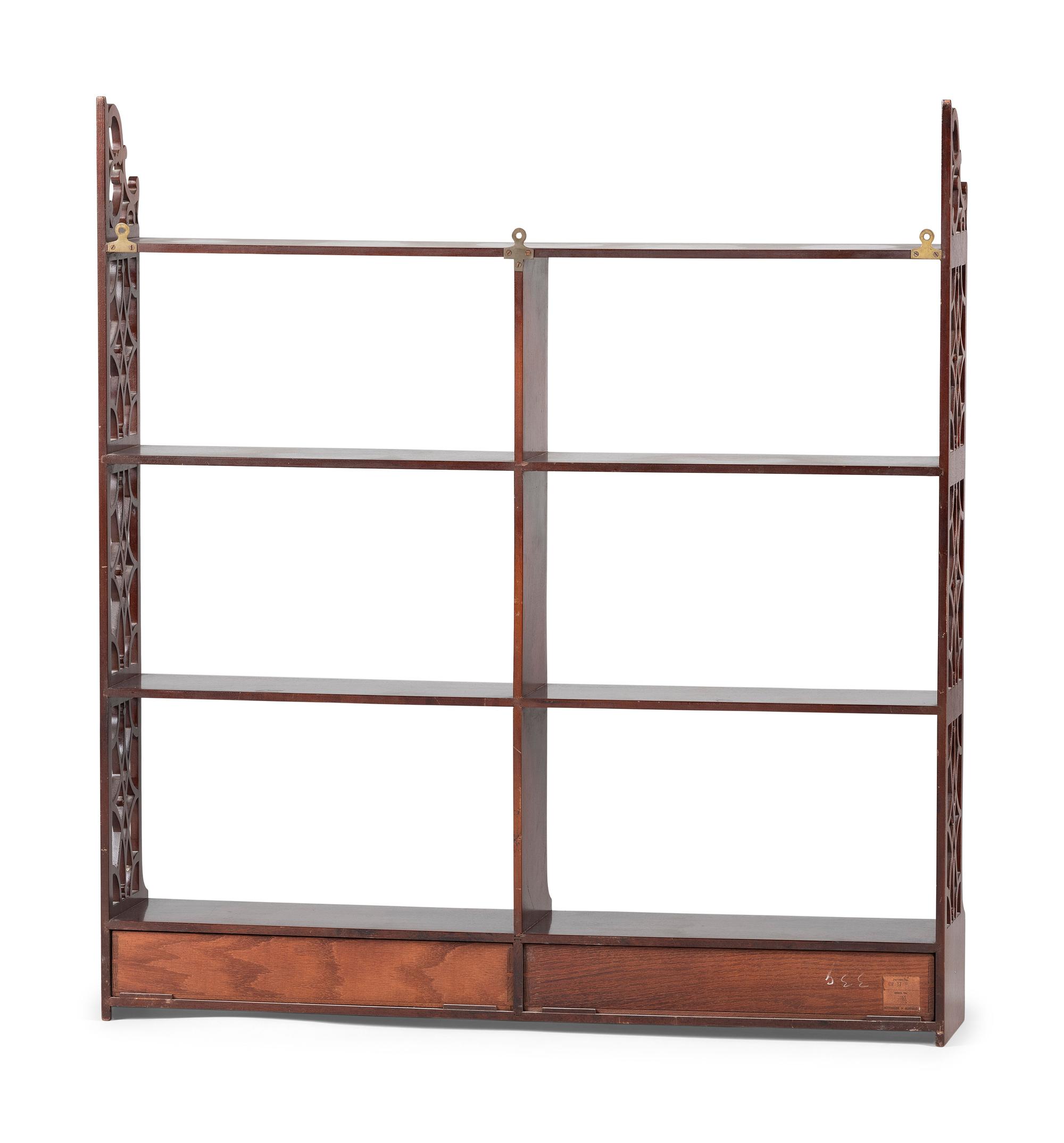 A Chippendale Style Carved and Figured Mahogany Hanging Plate Rack