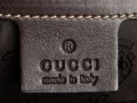 Gucci Monogram Clutch