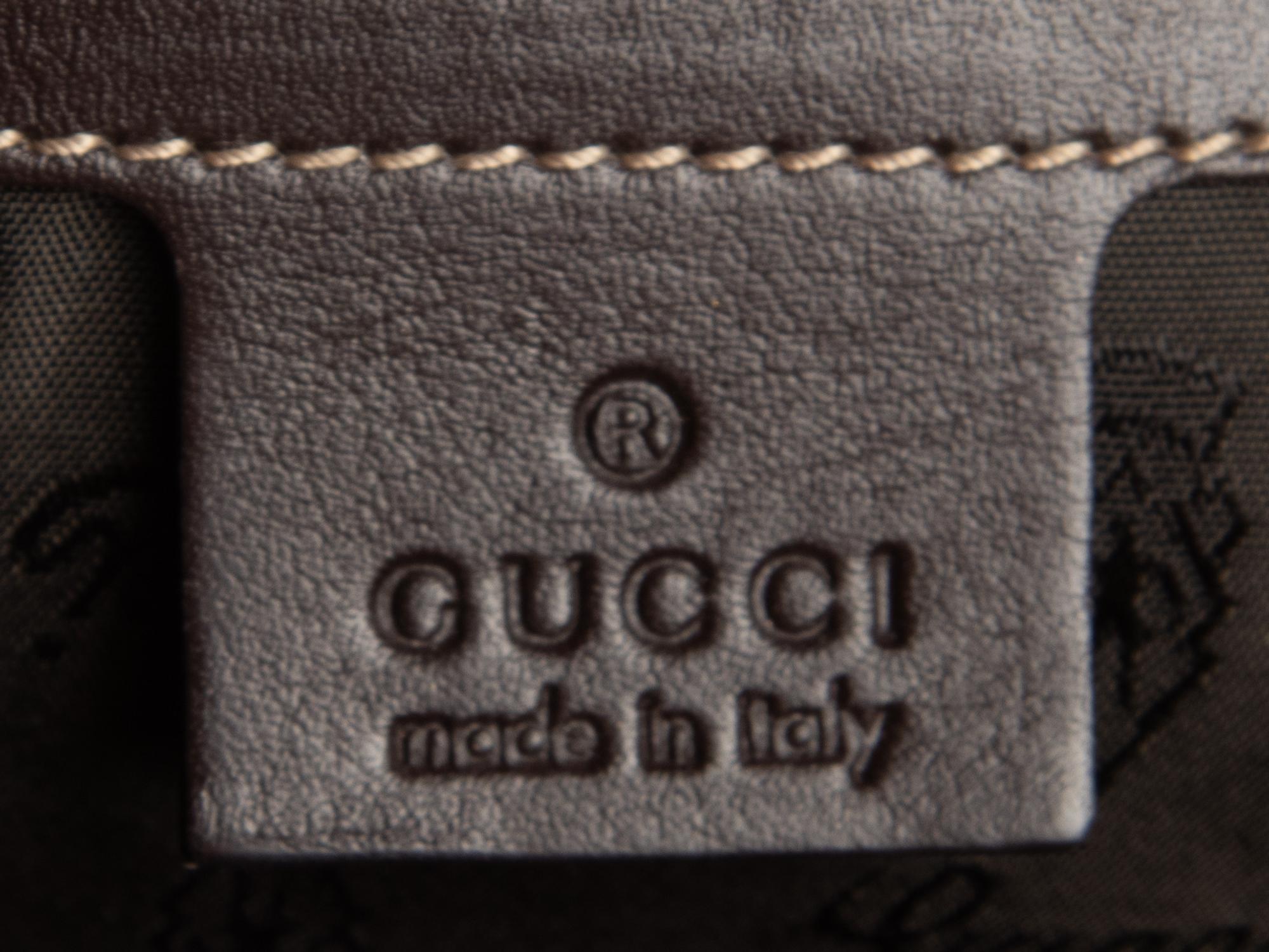 Gucci Monogram Clutch