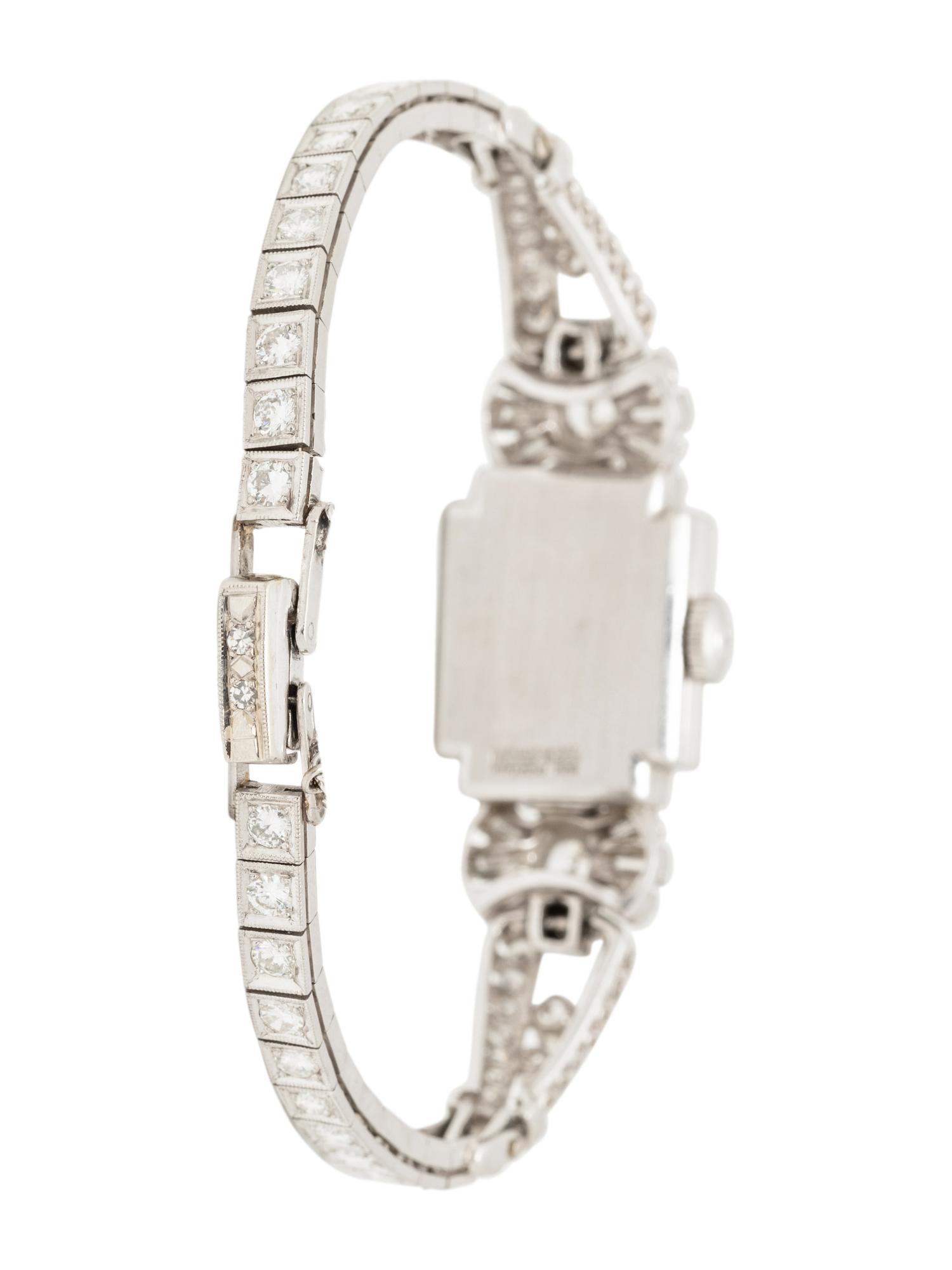 HAMILTON, PLATINUM AND DIAMOND HIDDEN DIAL WATCH