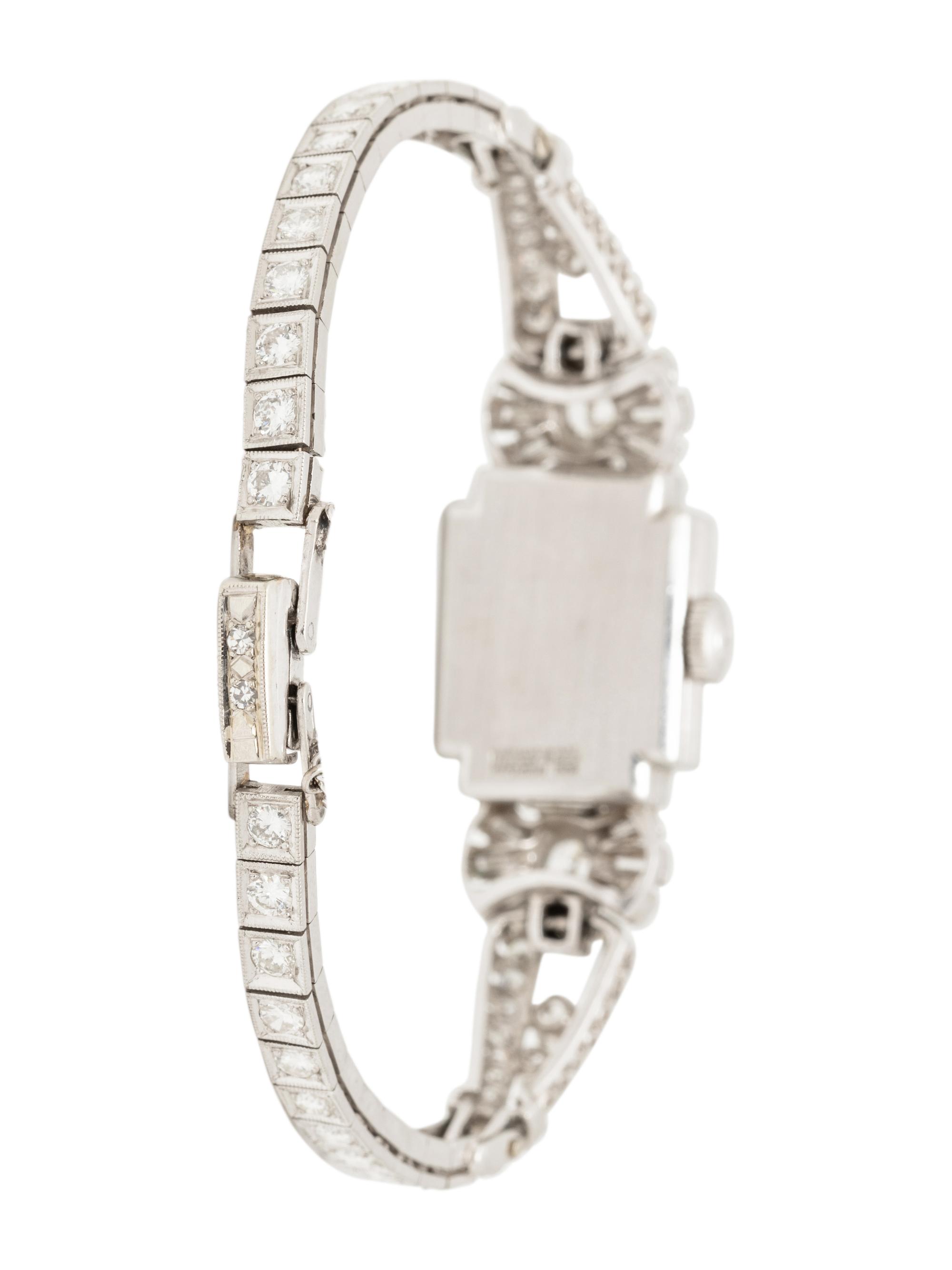 HAMILTON, PLATINUM AND DIAMOND HIDDEN DIAL WATCH