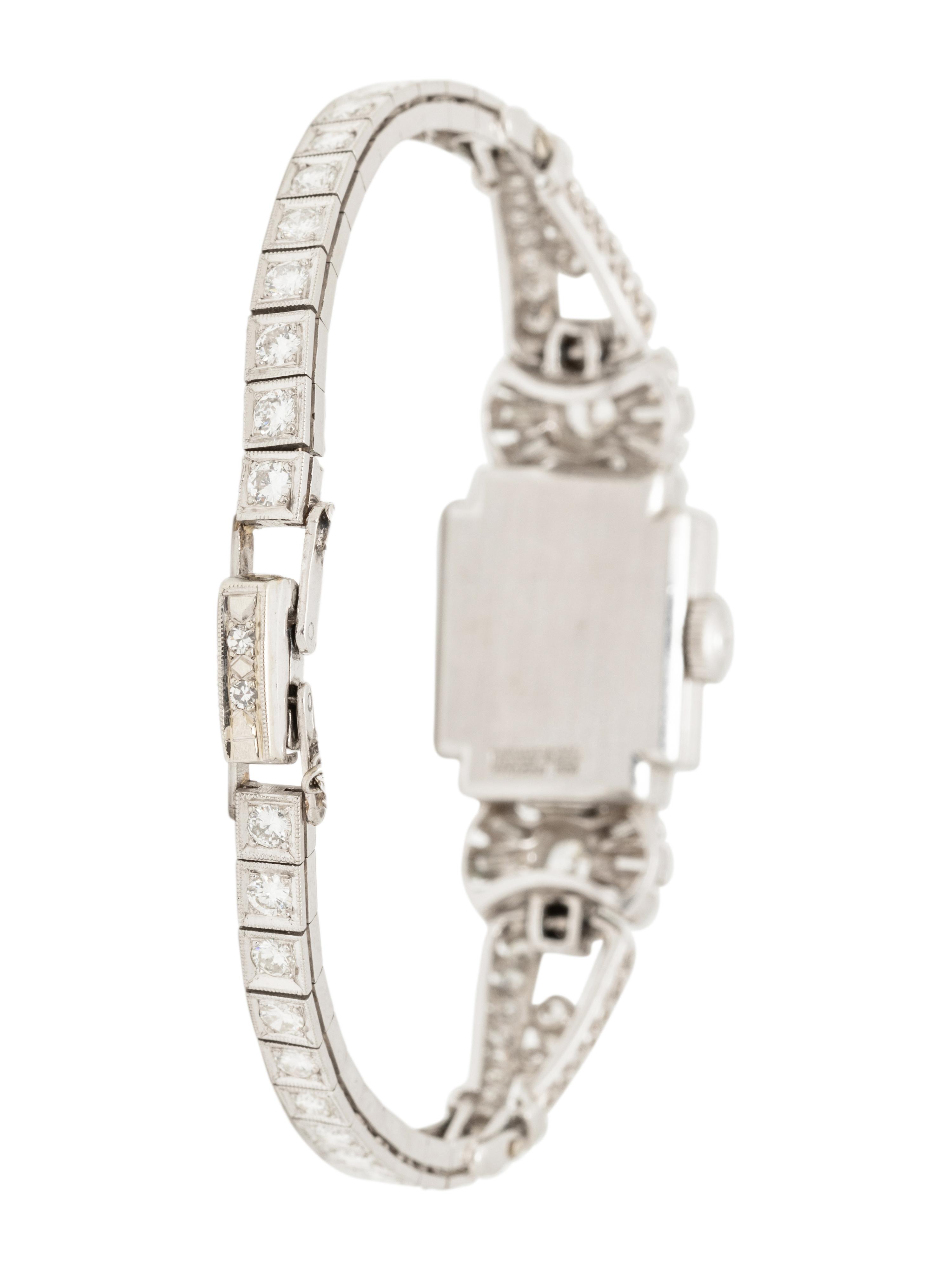 HAMILTON, PLATINUM AND DIAMOND HIDDEN DIAL WATCH