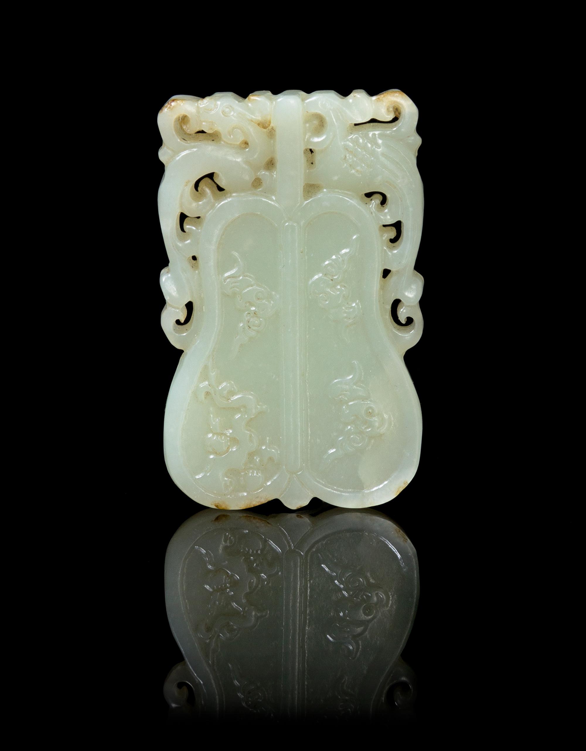 A Carved Jade Pendant Height 2 1/4 inches.