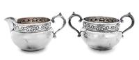 A Silver Sugar and Creamer Set, Gorham Mfg. Co., Providence, RI, 20th Century, each with a stylized foliate band.