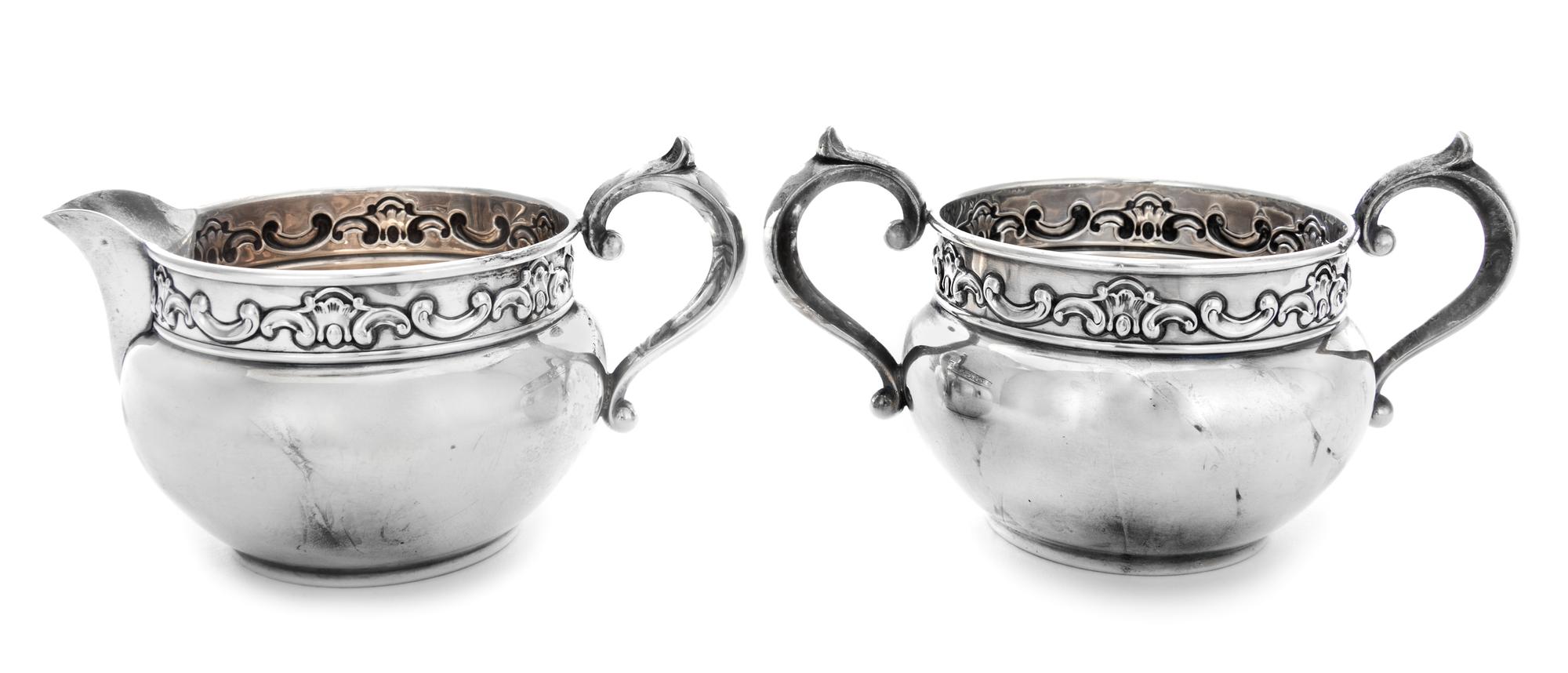 A Silver Sugar and Creamer Set, Gorham Mfg. Co., Providence, RI, 20th Century, each with a stylized foliate band.