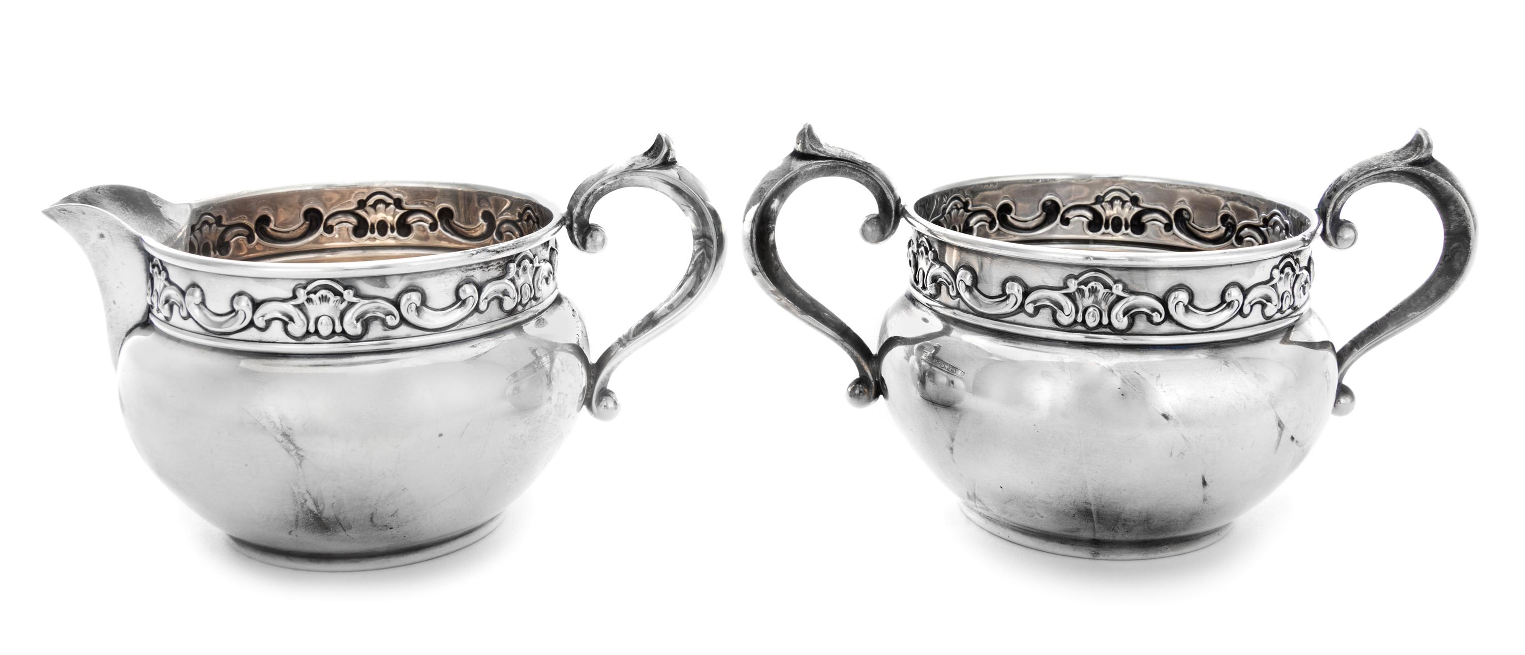 A Silver Sugar and Creamer Set, Gorham Mfg. Co., Providence, RI, 20th Century, each with a stylized foliate band.