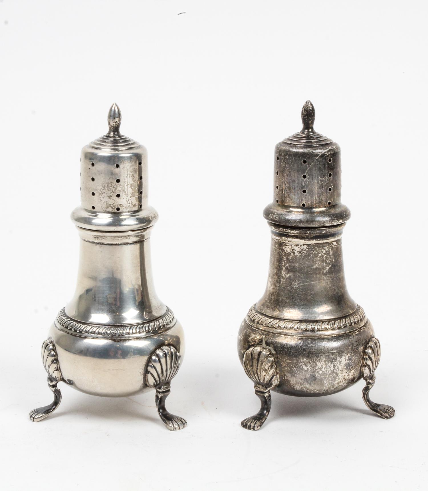 A Pair of American Silver Casters, Hunt Silver Company, Chicago, IL, 20th Century, having a pierced top with a baluster body and raised