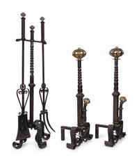A Pair of Continental Brass and Iron Andirons and Fender