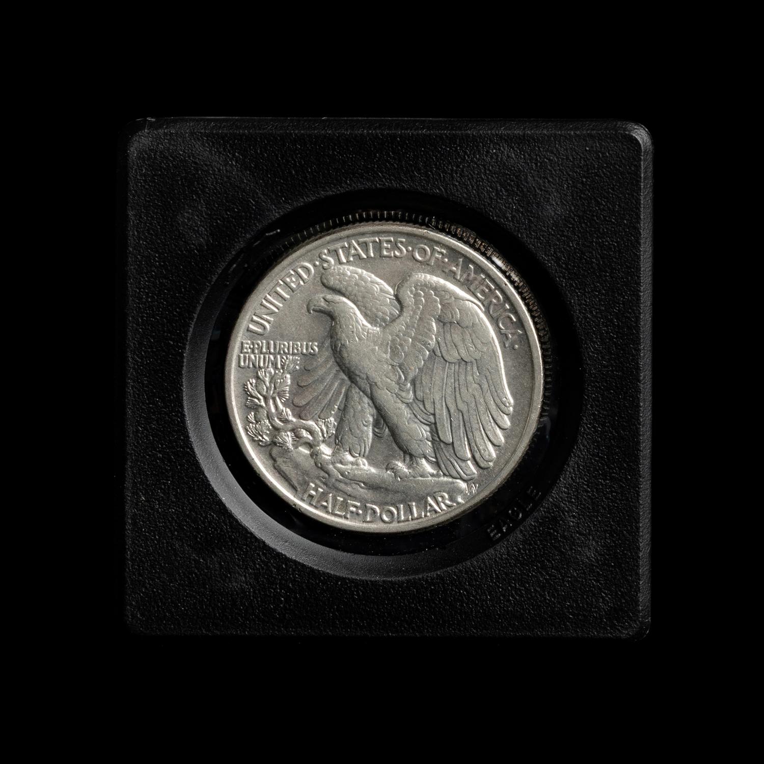 A Collection of Twenty-Six Walking Liberty 50c Coins