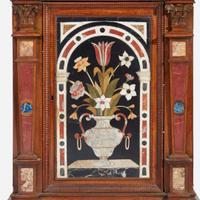 An Italian Renaissance Style Carved Walnut Cabinet with Pietra Dura Panels the cabinet 19th century, the pietra dura 18th century