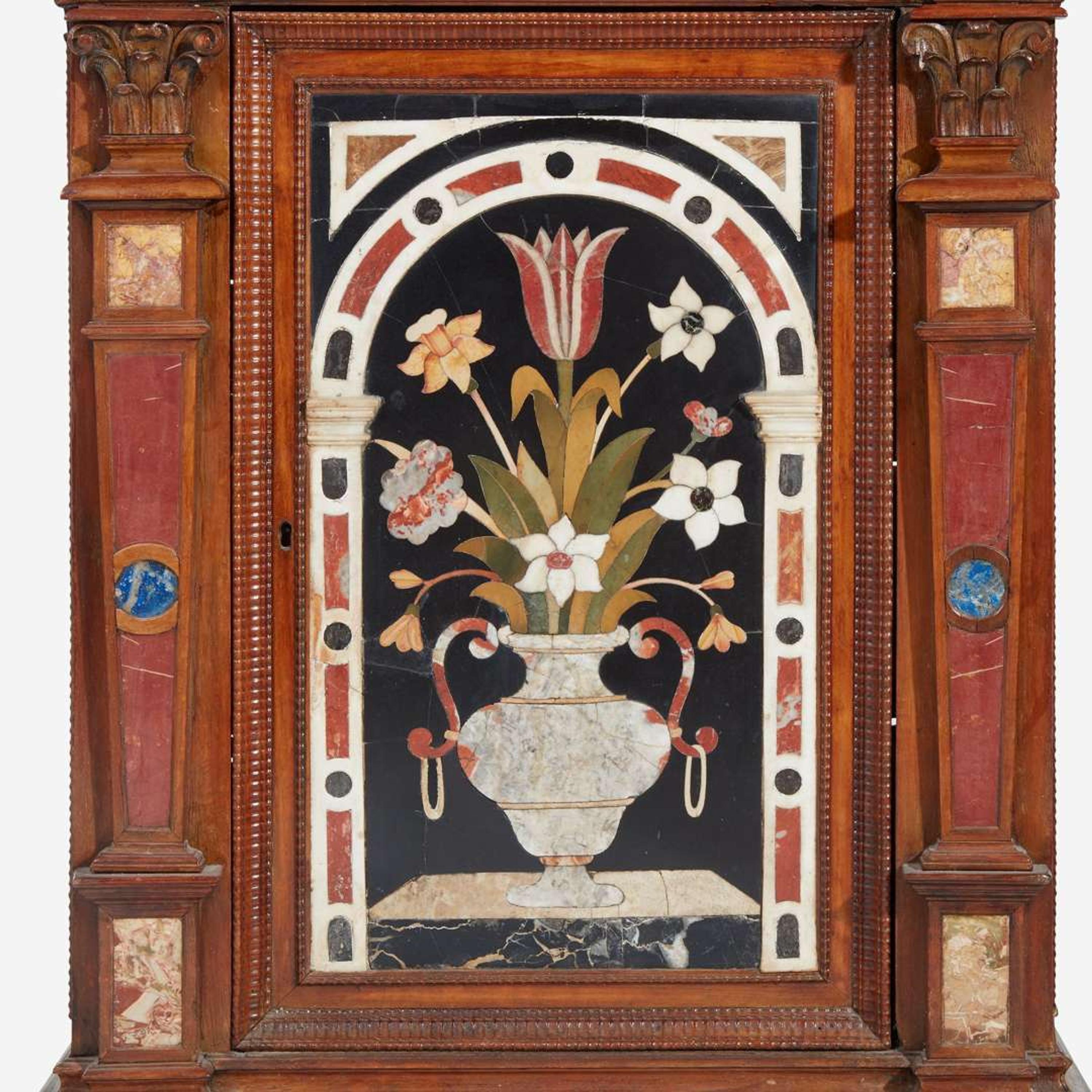 An Italian Renaissance Style Carved Walnut Cabinet with Pietra Dura Panels the cabinet 19th century, the pietra dura 18th century