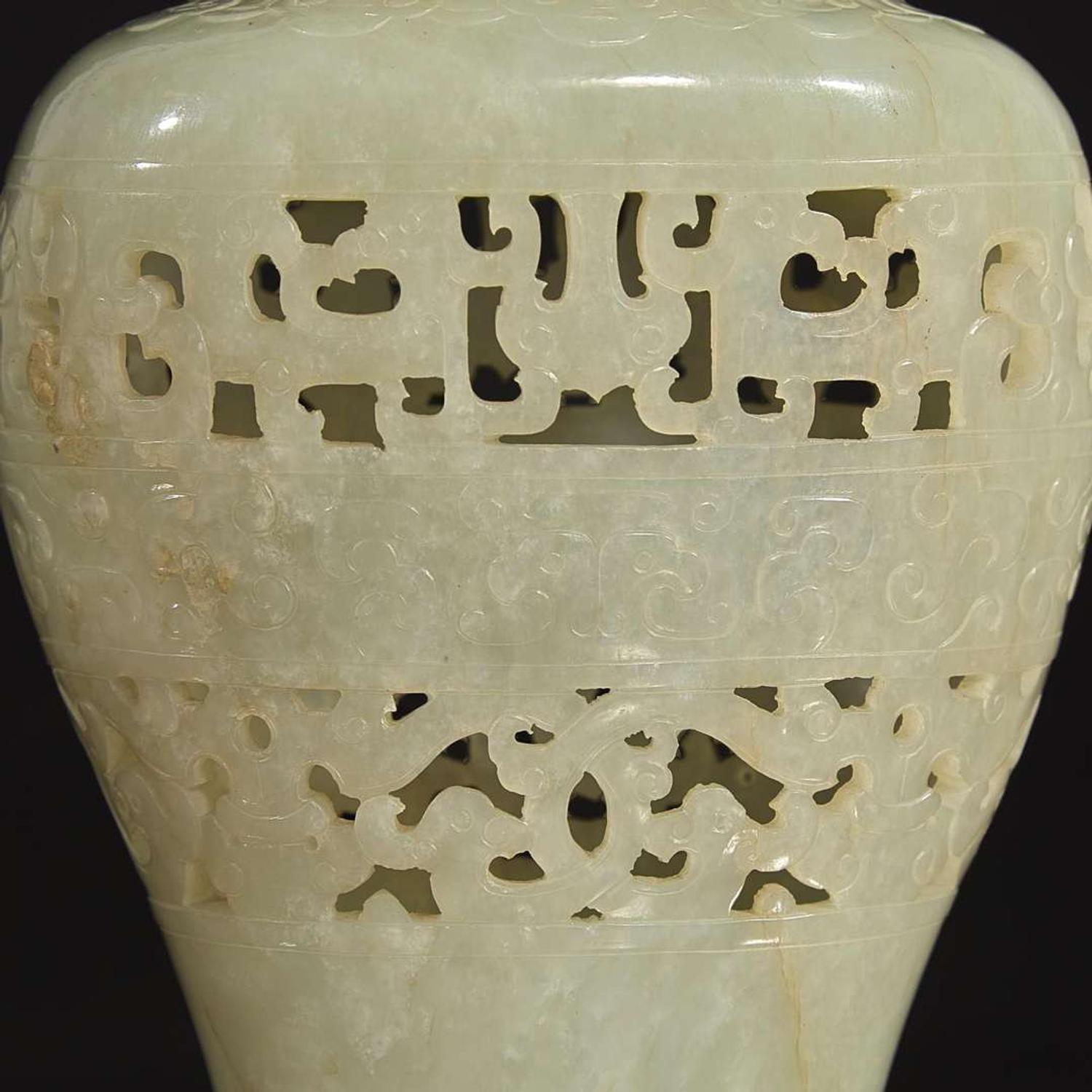 A Chinese carved pale celadon jade reticulated vase and cover 透雕青白玉盖樽 Qing dynasty ?