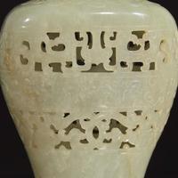 A Chinese carved pale celadon jade reticulated vase and cover 透雕青白玉盖樽 Qing dynasty ?