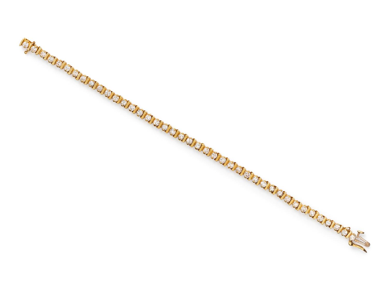 A 14 Karat Yellow Gold and Diamond Bracelet,