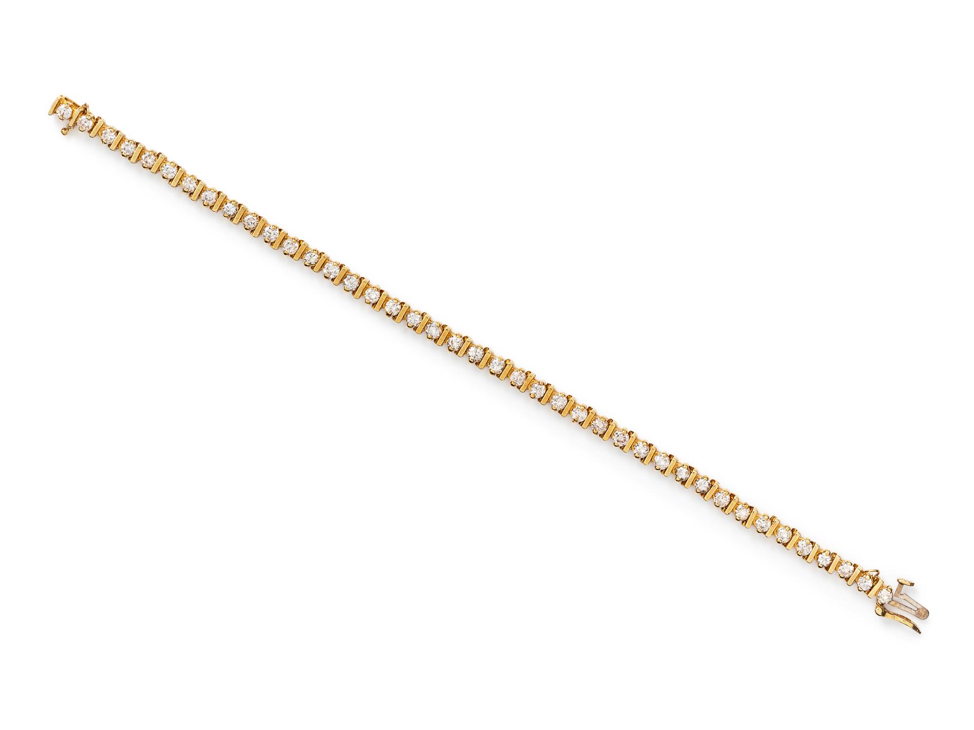 A 14 Karat Yellow Gold and Diamond Bracelet,
