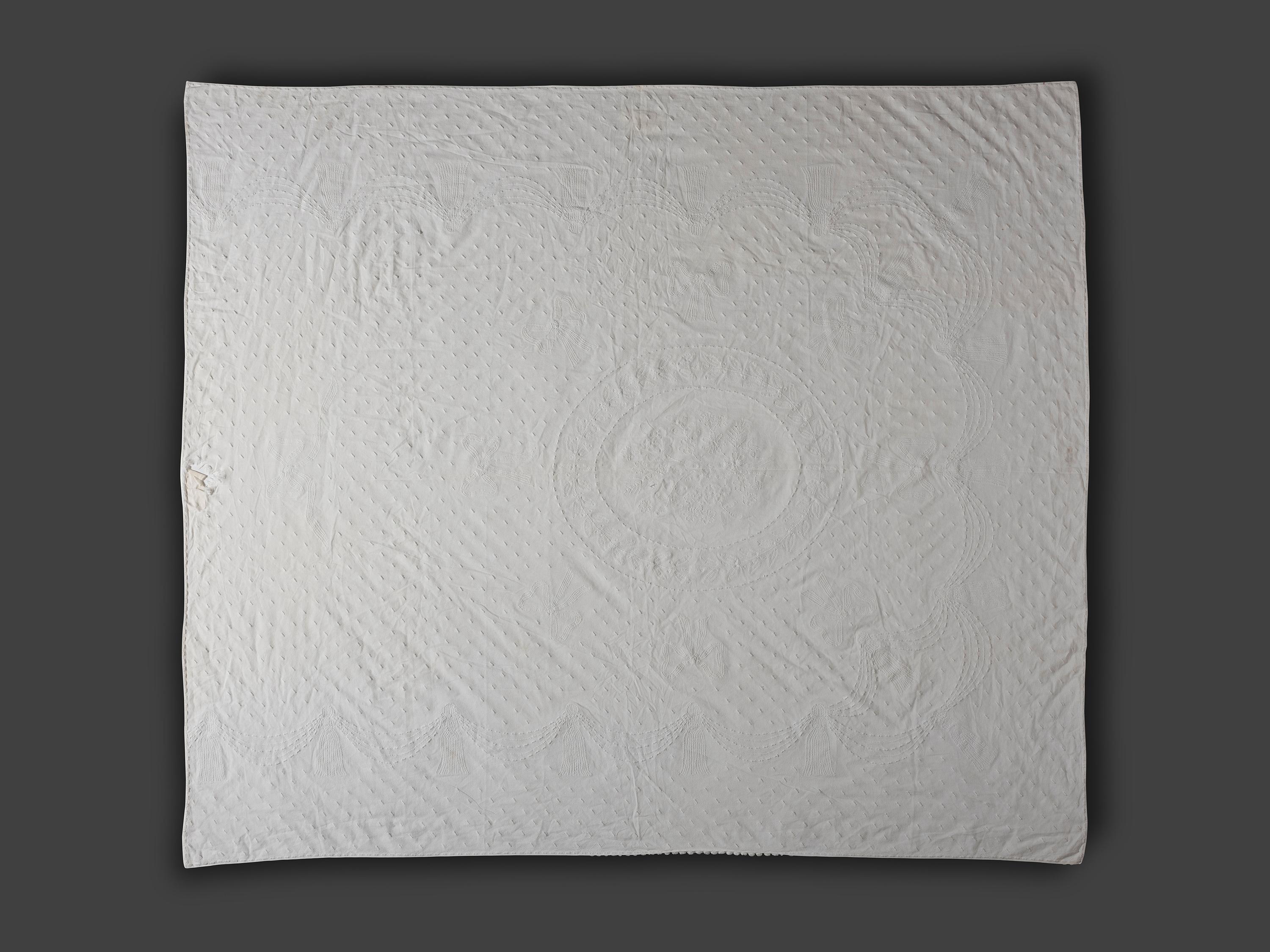 Two Whitework Bed Covers