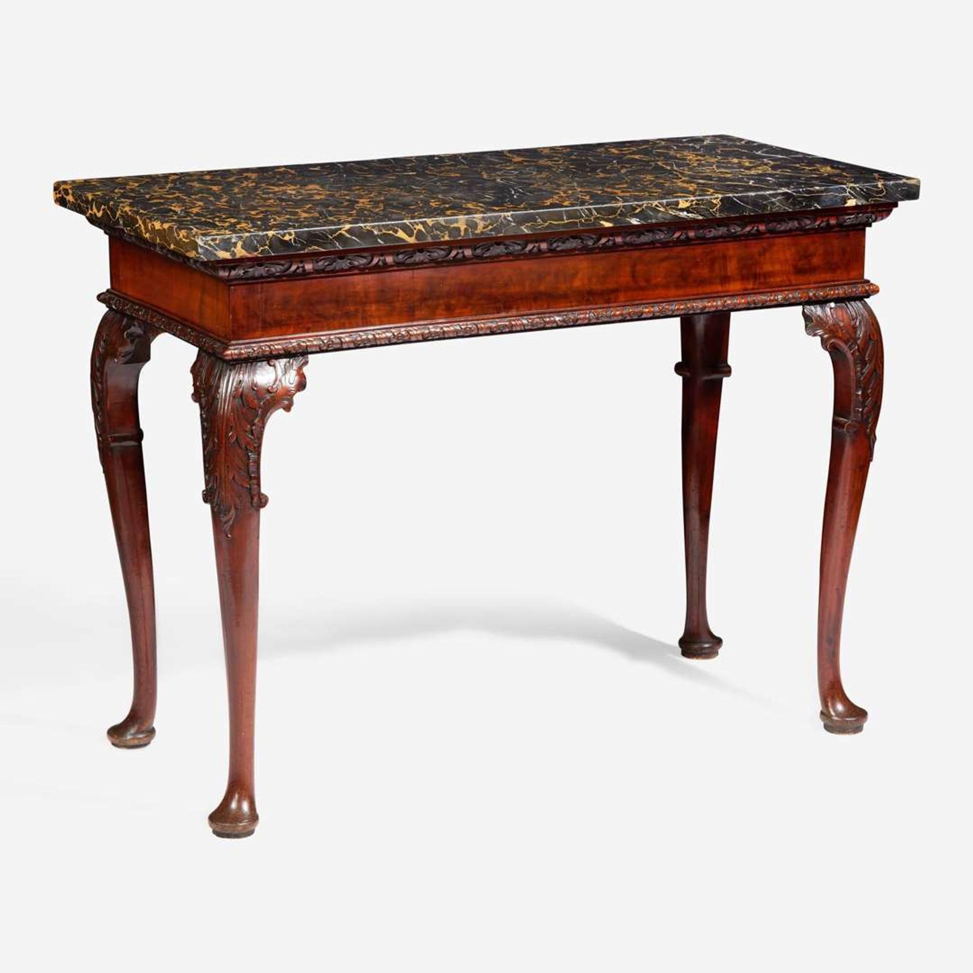 A George II rectangular carved walnut side table with Portoro marble top mid-18th century