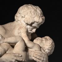 A Grand Tour Marble Group of Silenus and the Infant Bacchus