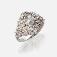 An eighteen karat gold and diamond ring