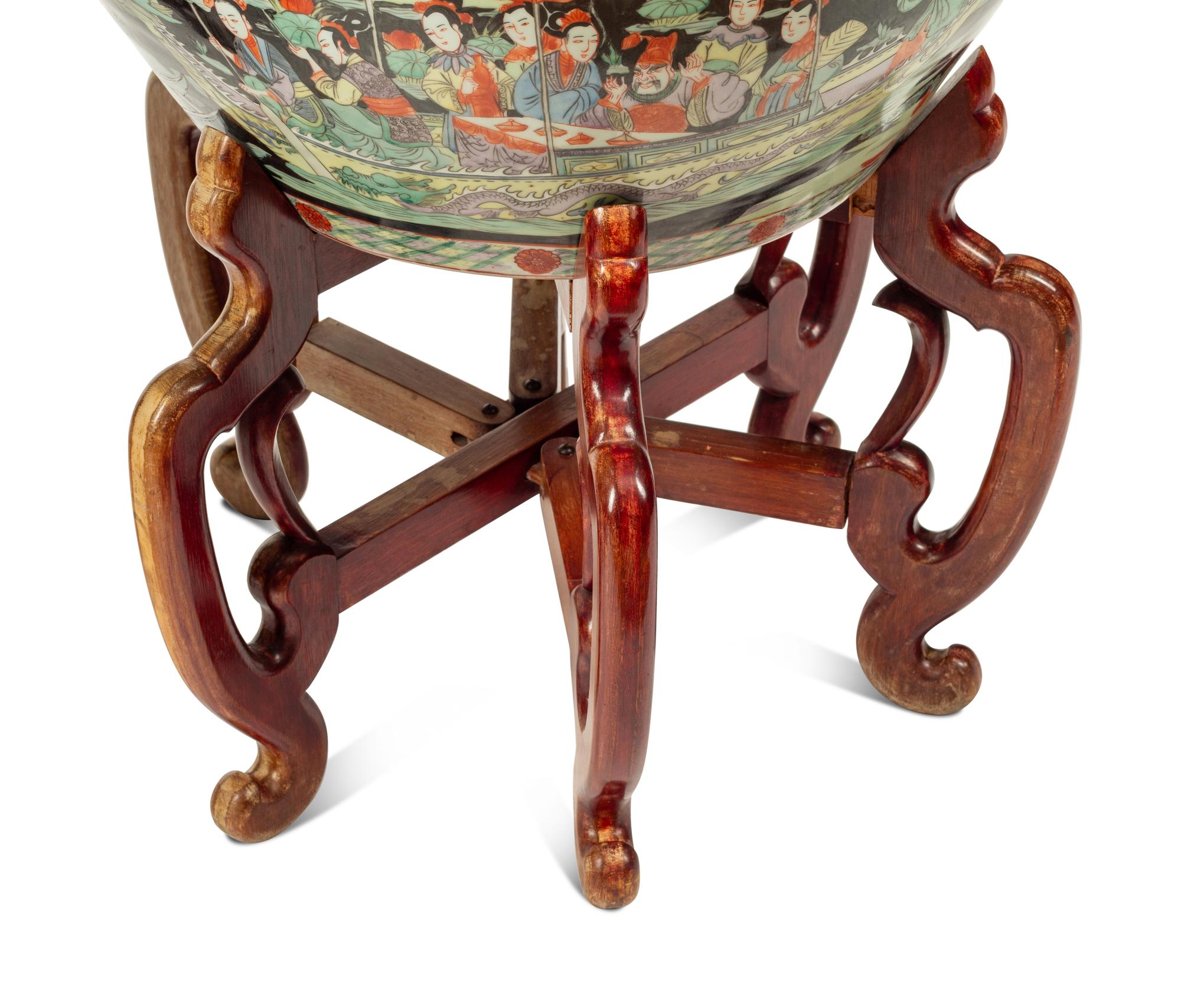 A Pair of Chinese Export Porcelain Fish Bowls with Wood Stands