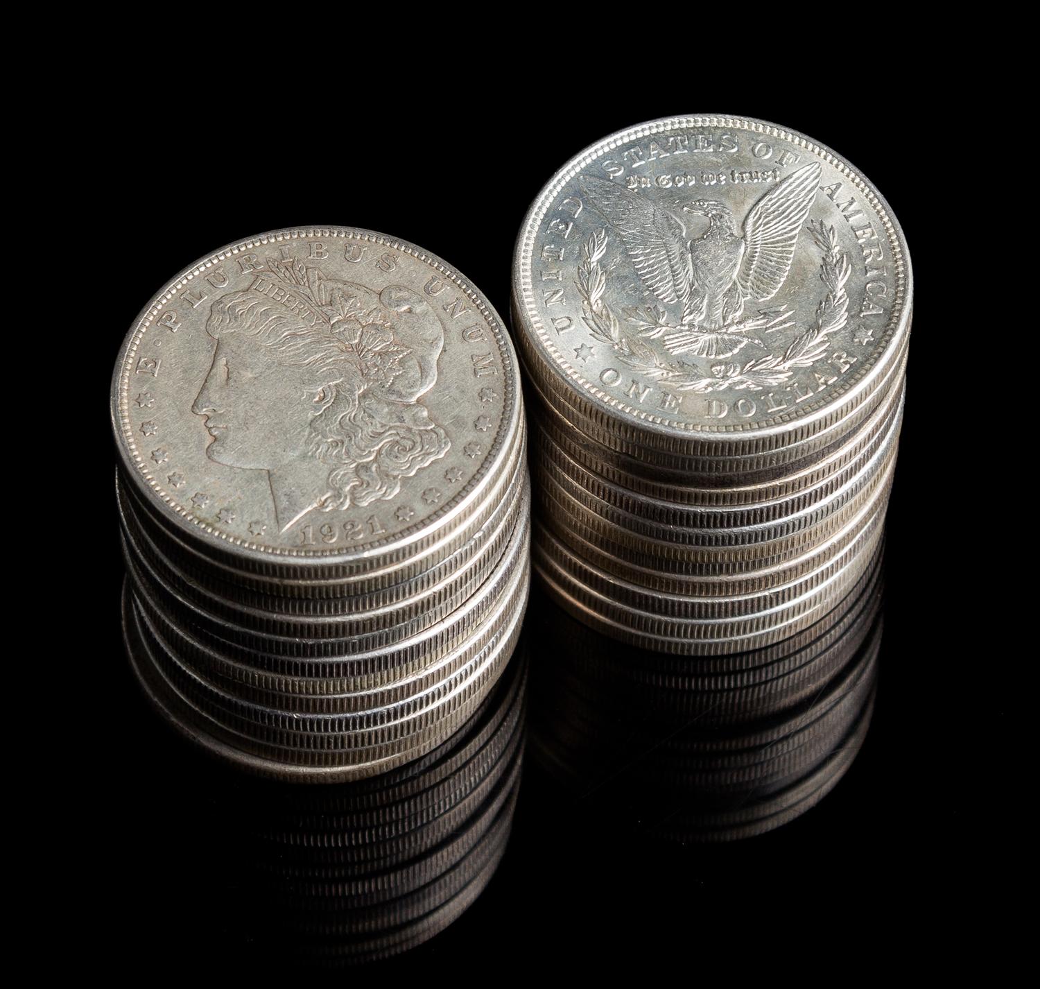 A Group of 22 Morgan Silver Dollars