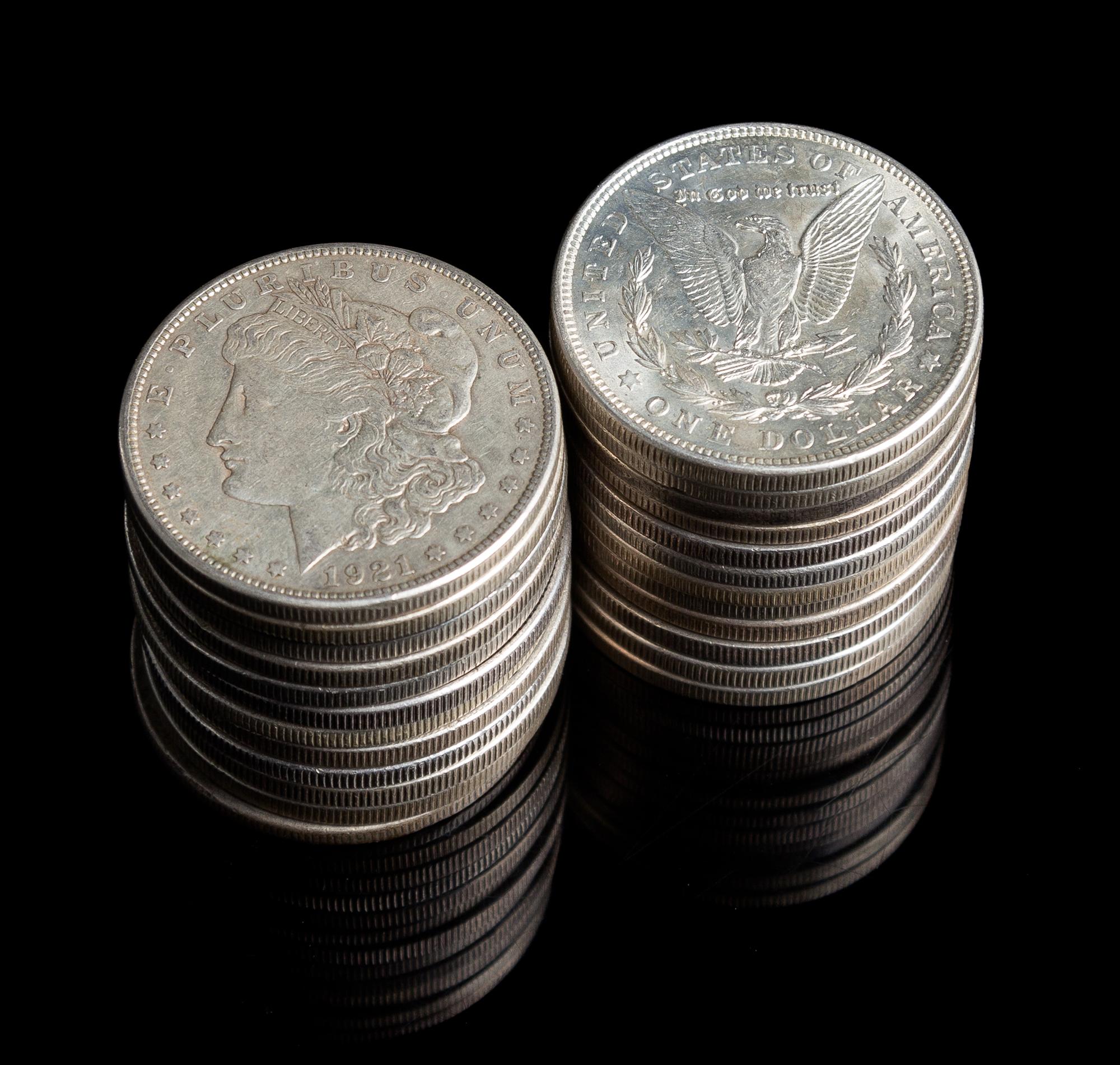 A Group of 22 Morgan Silver Dollars