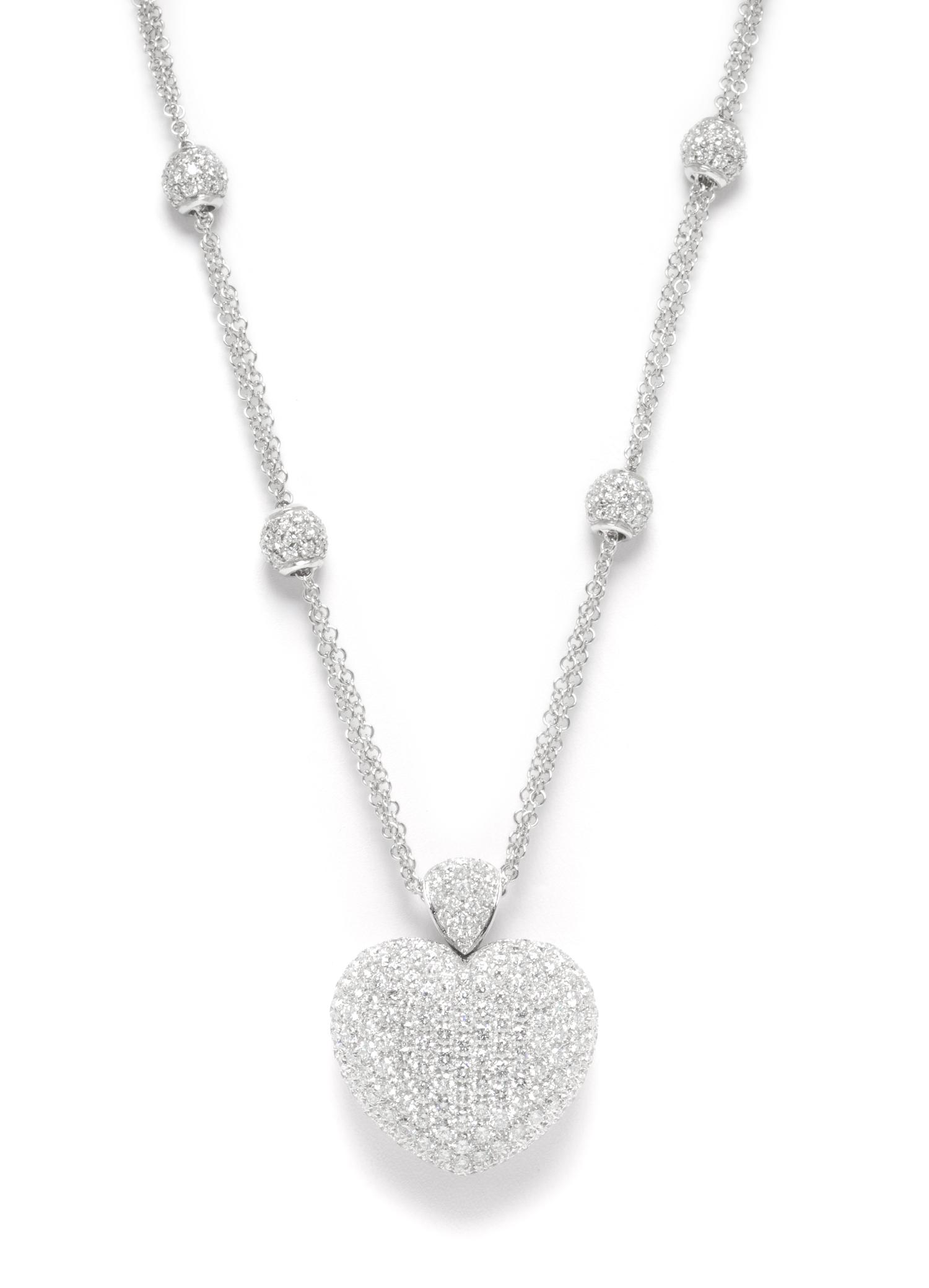 An 18 Karat White Gold and Diamond Heart Necklace, 19.70 dwts.
