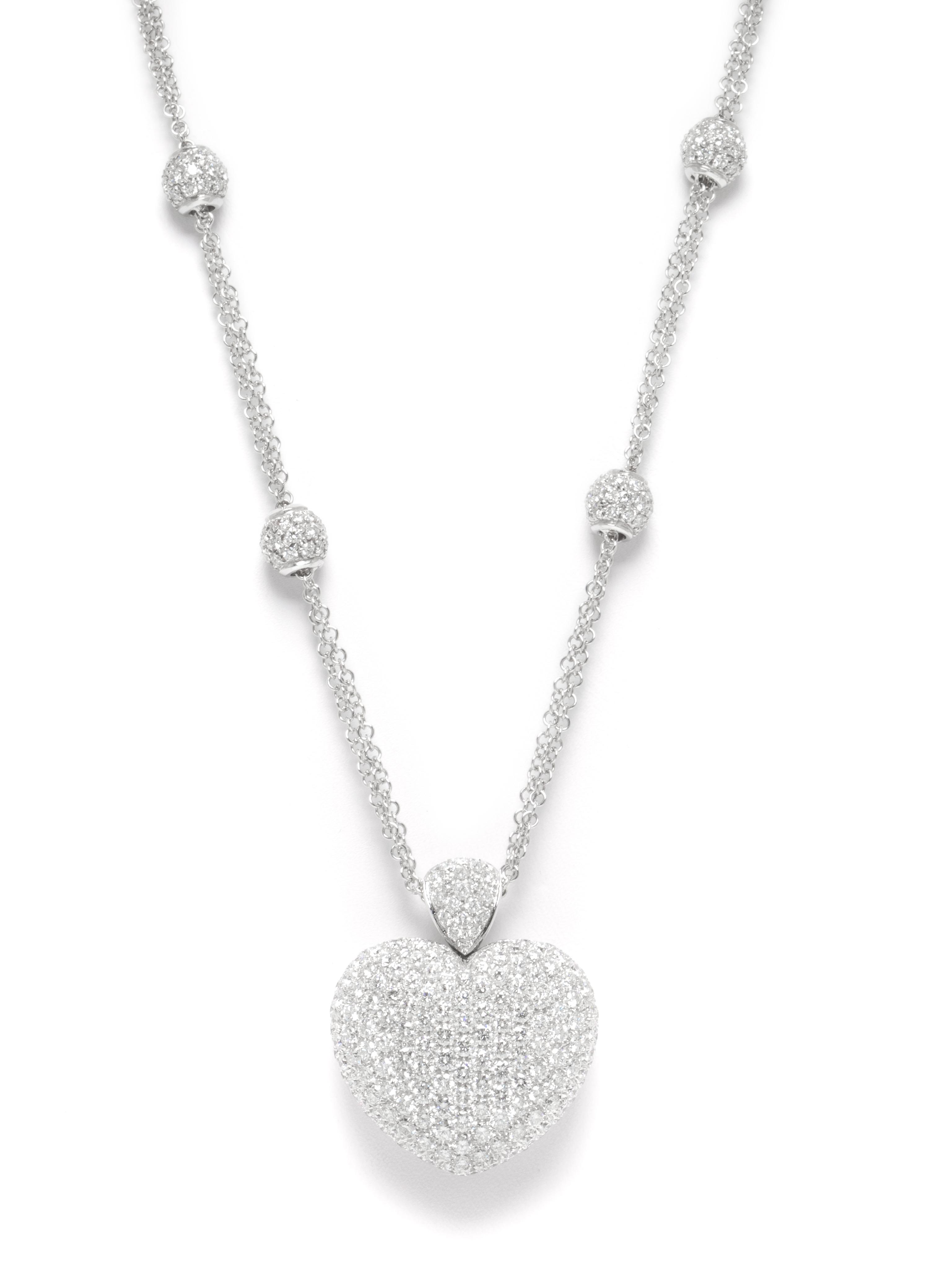 An 18 Karat White Gold and Diamond Heart Necklace, 19.70 dwts.