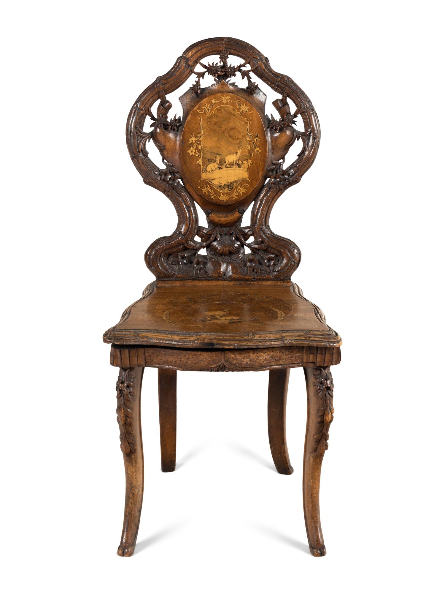 A Black Forest Carved Musical Chair