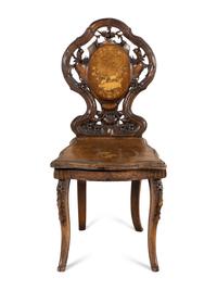 A Black Forest Carved Musical Chair