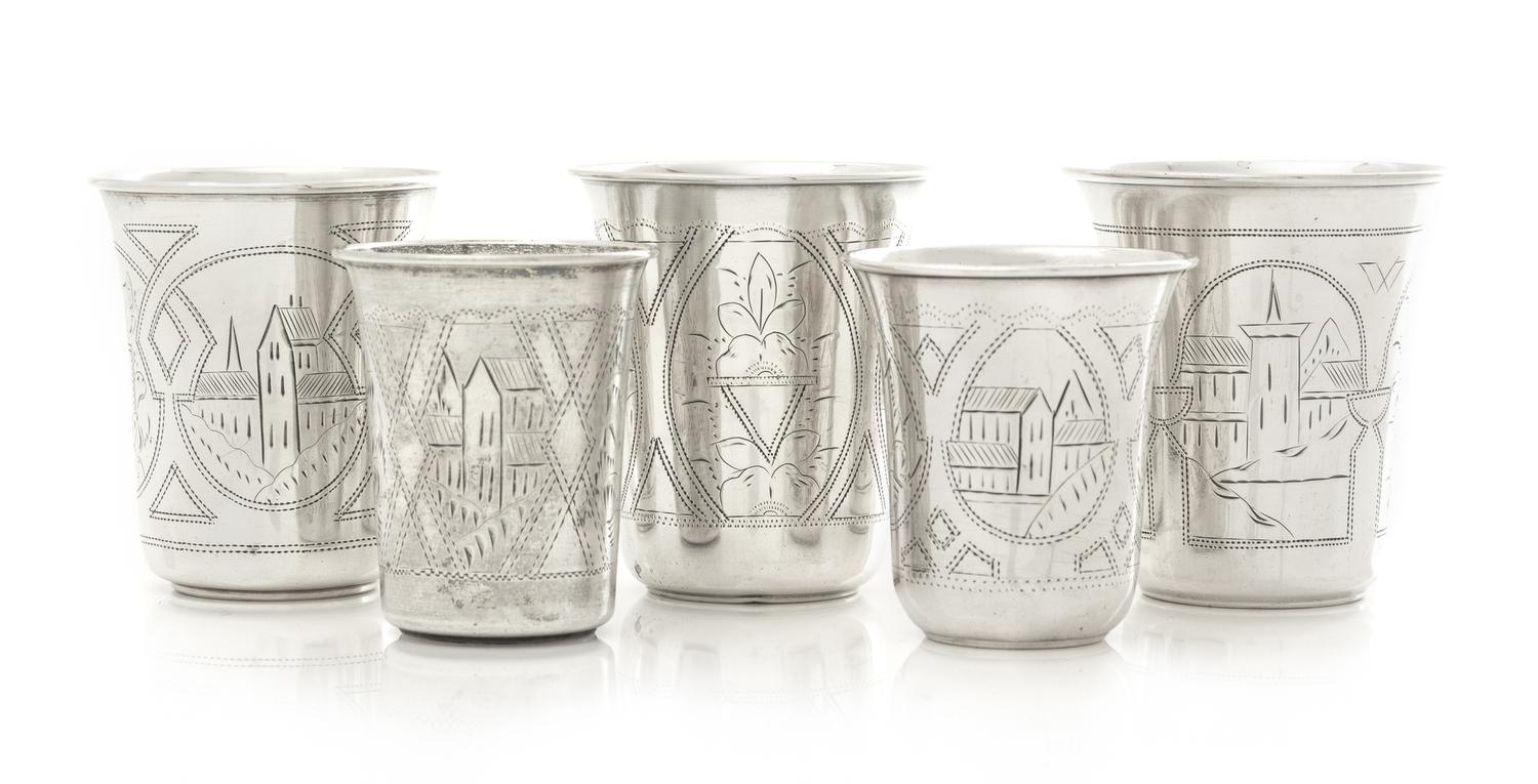 A Group of Five Russian Silver Beakers, Various Makers, 19th Century, each having a flared rim, the body worked to show buildings and f