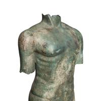 A Patinated Bronze Torso on Stone Plinth