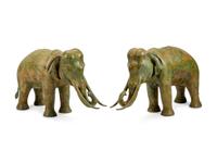 A Large Pair of Patinated Bronze Elephants