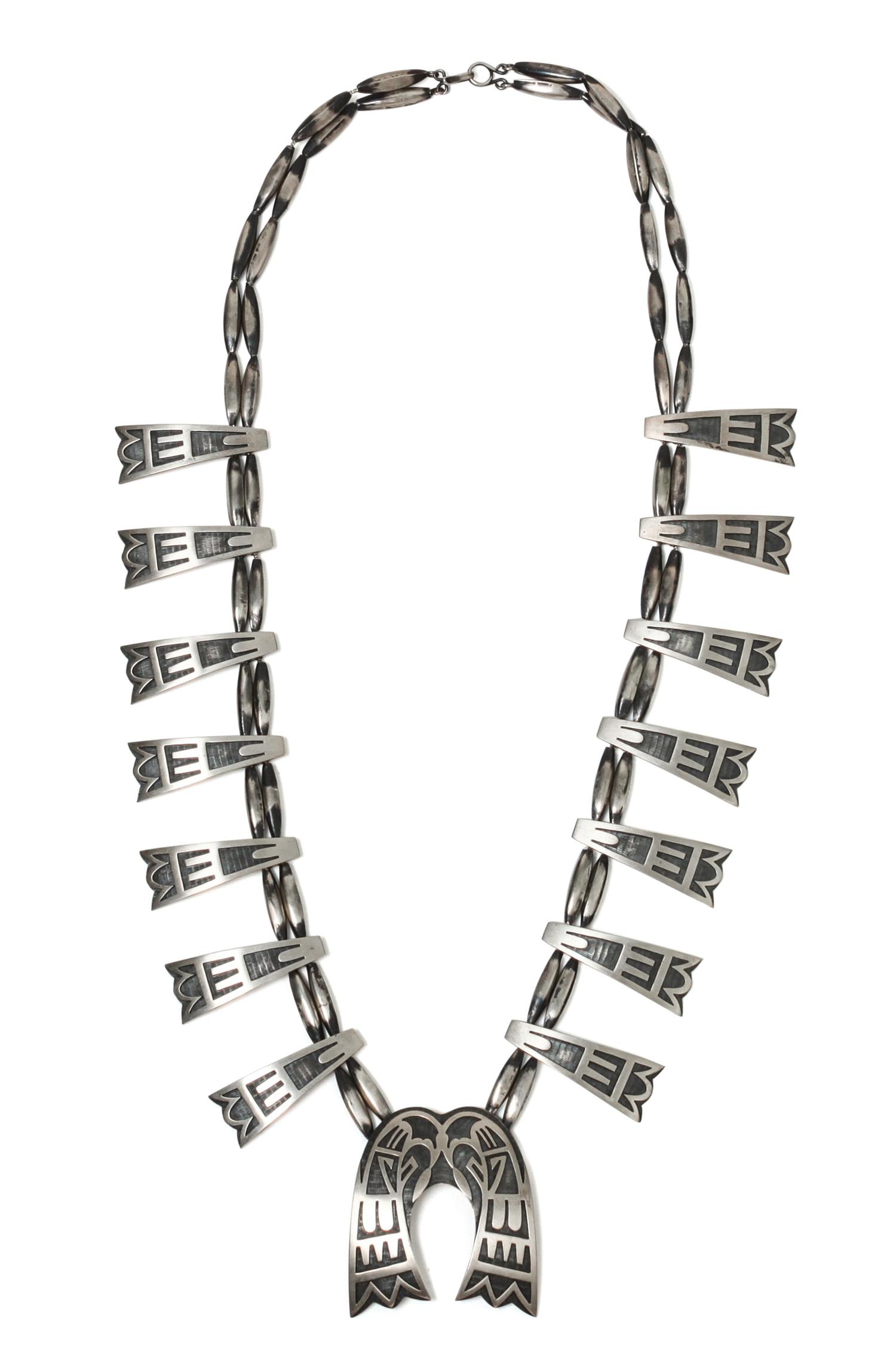 A Hopi Overlay Necklace Length 28 inches; naja height 2 1/4 x width 2 1/8 inches.