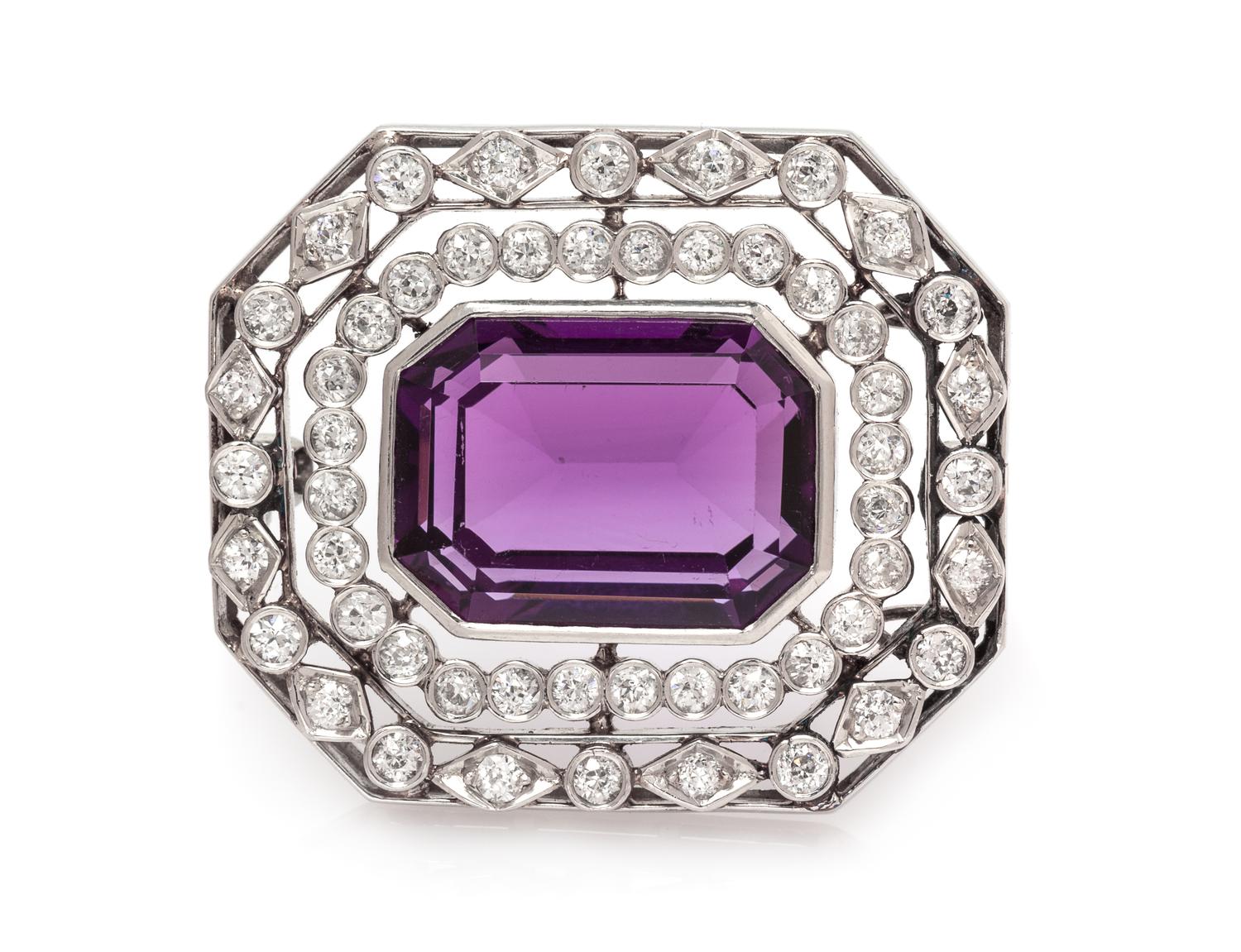 An Art Deco Platinum, Amethyst and Diamond Pendant/Brooch, 10.30 dwts.