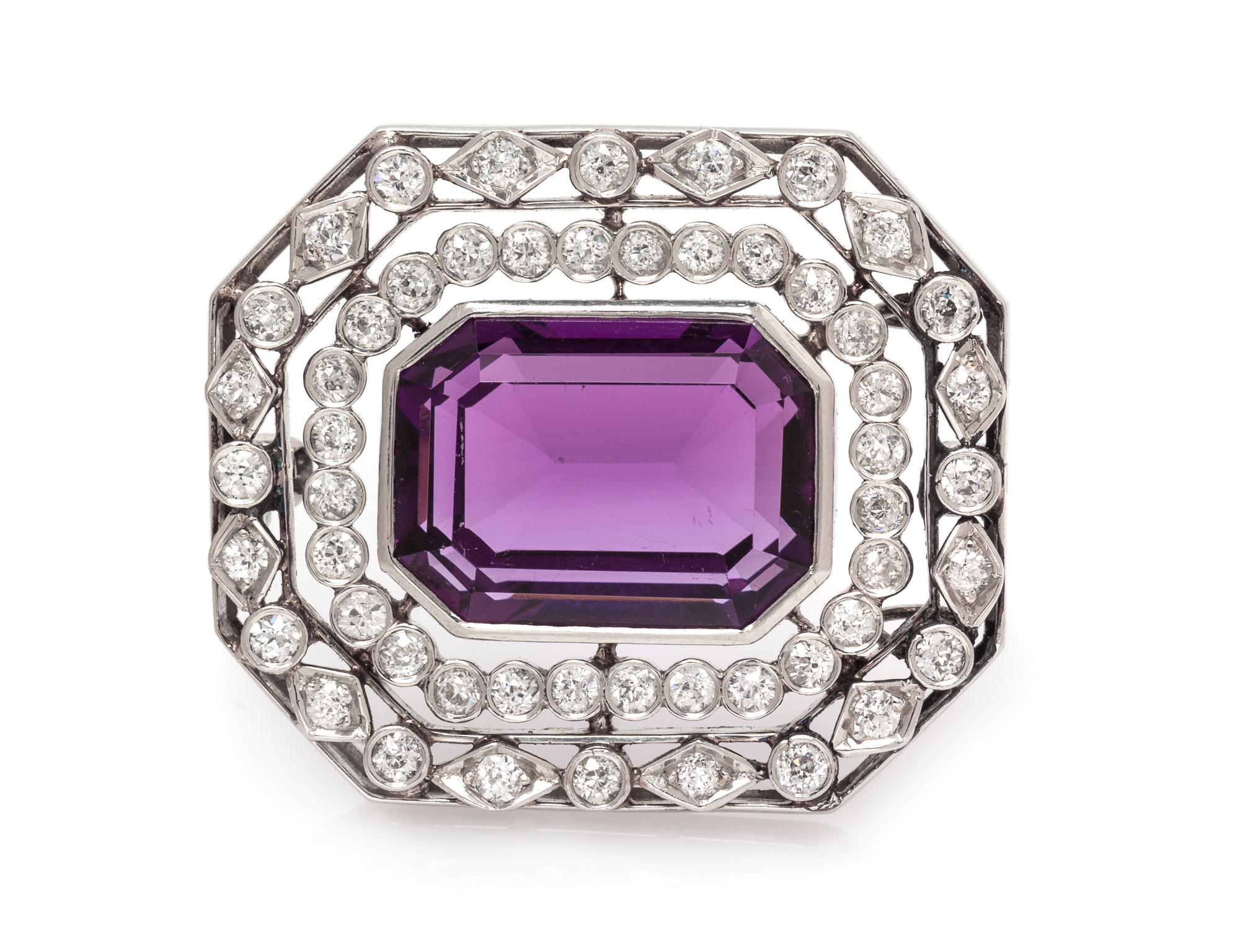An Art Deco Platinum, Amethyst and Diamond Pendant/Brooch, 10.30 dwts.