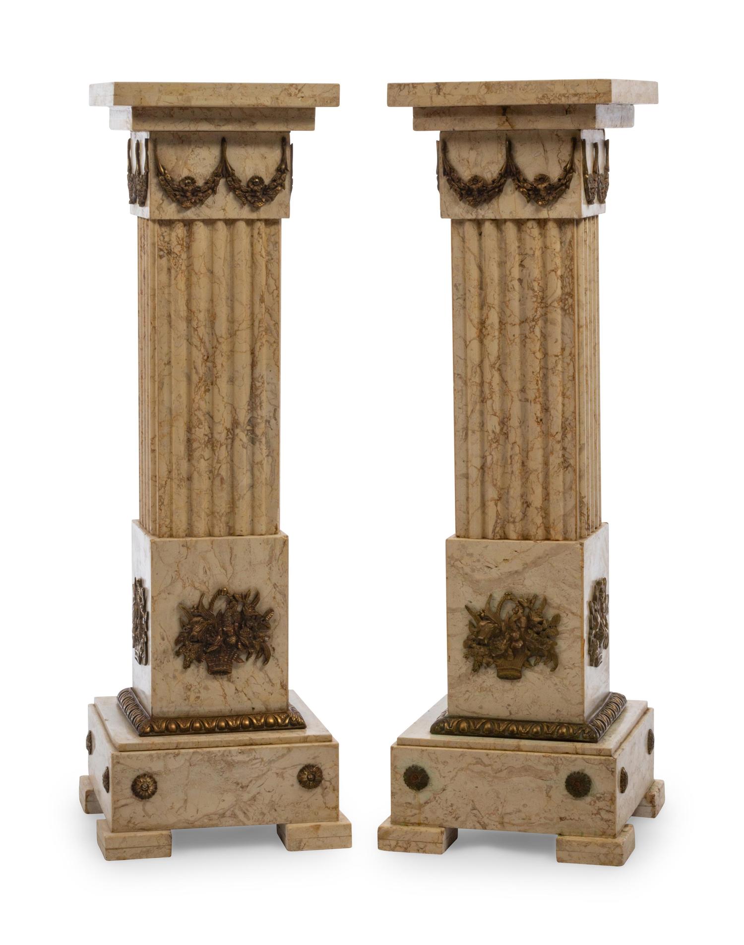 A Pair of Louis XVI Style Gilt Metal Mounted Marble Pedestals