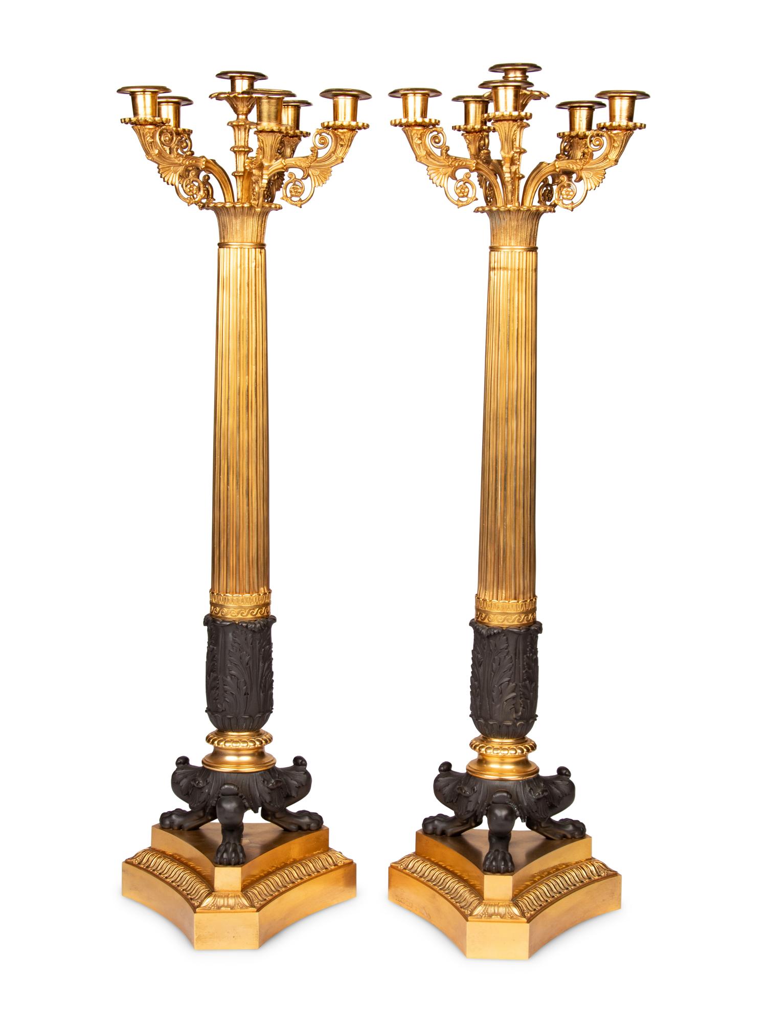 A Pair of Large Empire Style Gilt and Patinated Metal Six-Light Candelabra