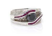 A 14 Karat White Gold, Black Diamond, Diamond and Ruby Ring, 10.60 dwts.
