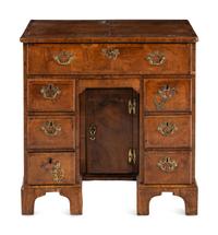 A George II Walnut Kneehole Desk