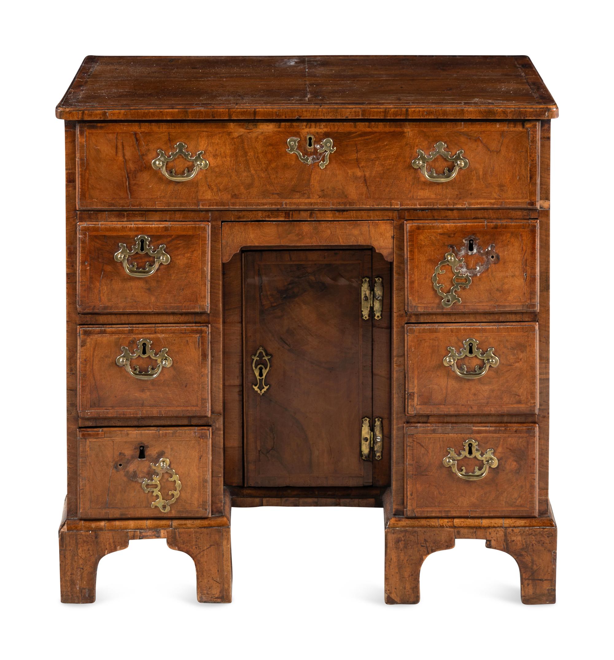 A George II Walnut Kneehole Desk