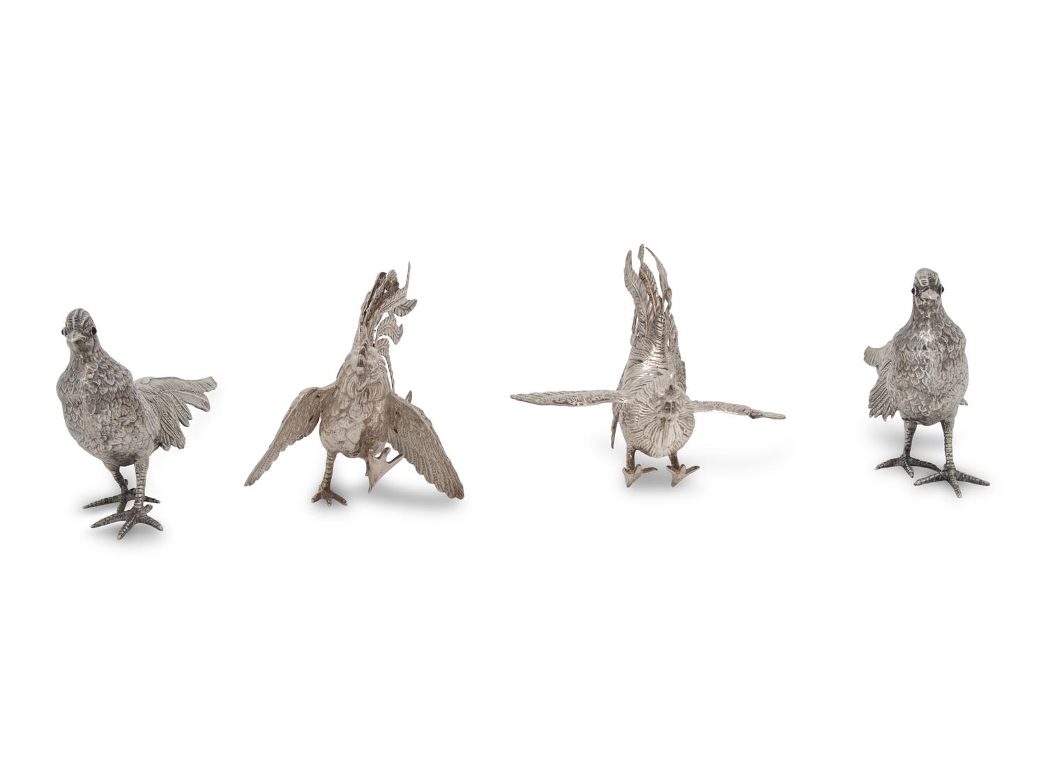 A Group of Four Silver Ornithological Table Ornaments