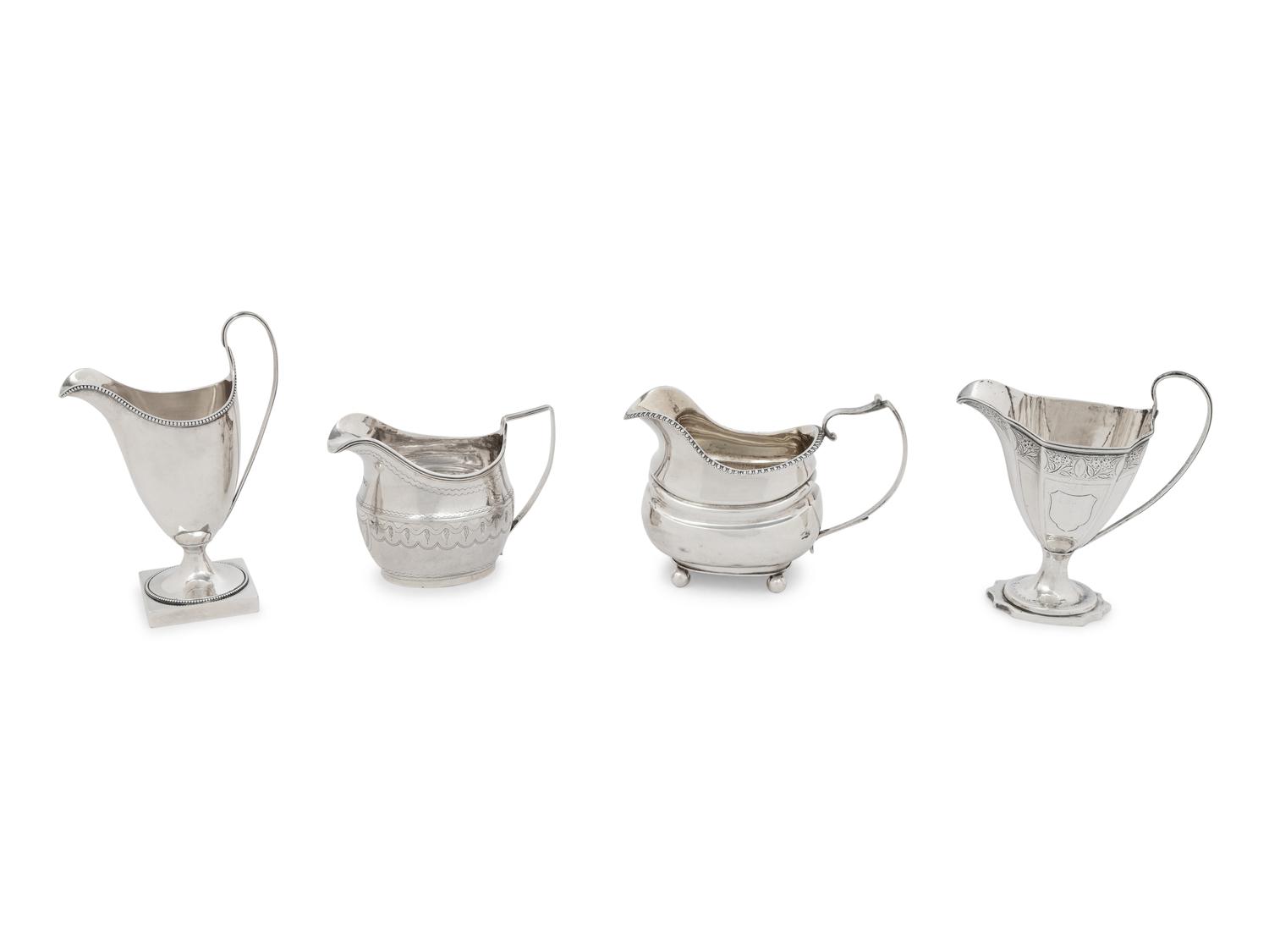 A Group of Four English Silver Creamers