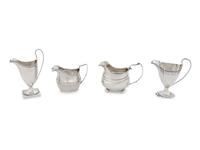 A Group of Four English Silver Creamers