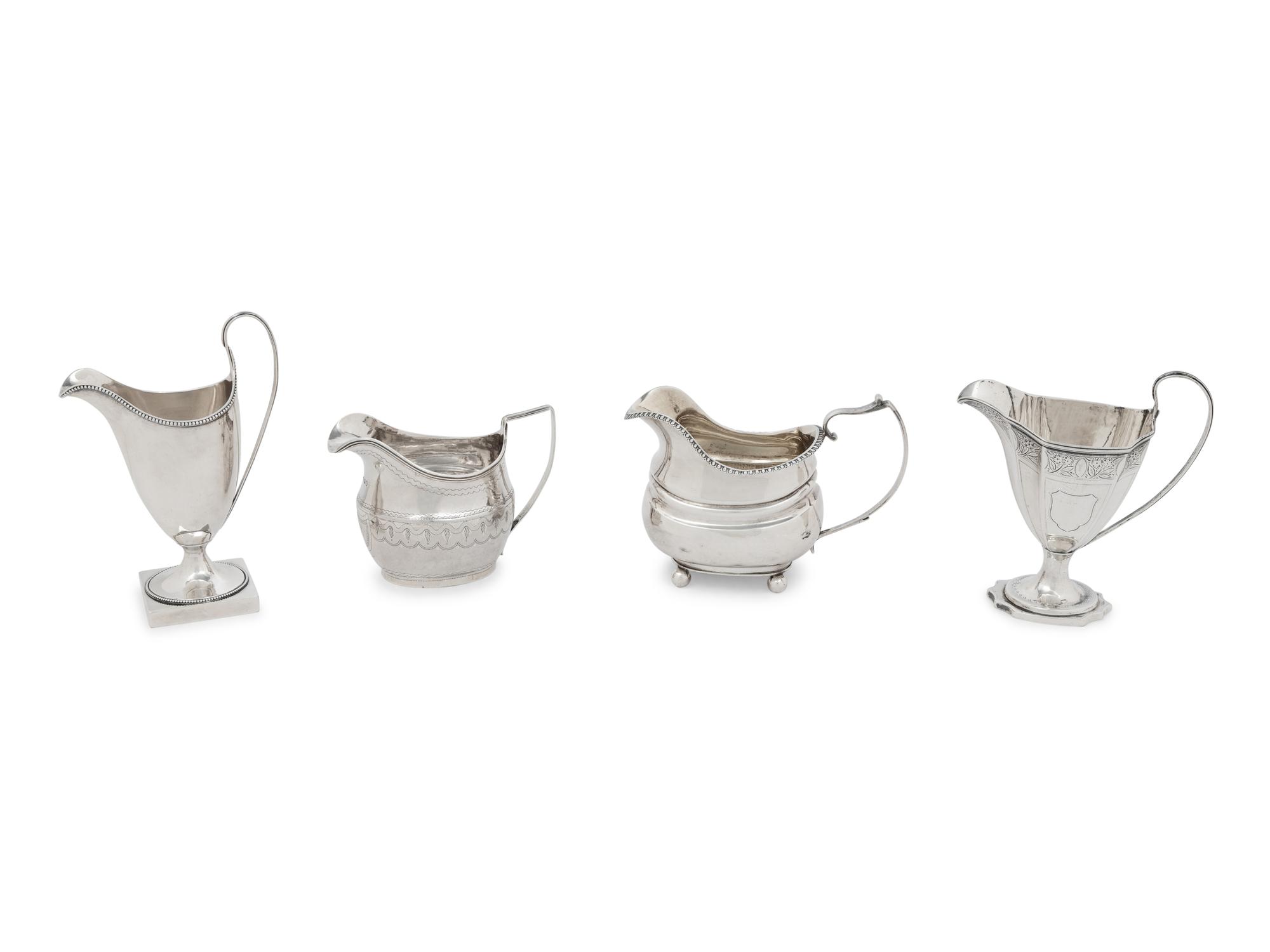 A Group of Four English Silver Creamers