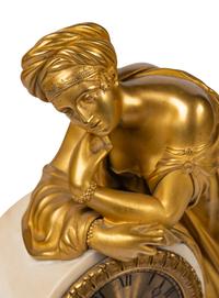 A Louis Philippe Gilt Bronze and White Marble Mantel Clock