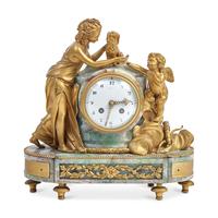 A Louis XVI Style Gilt-Bronze Mounted Green Onyx Figural Mantel Clock